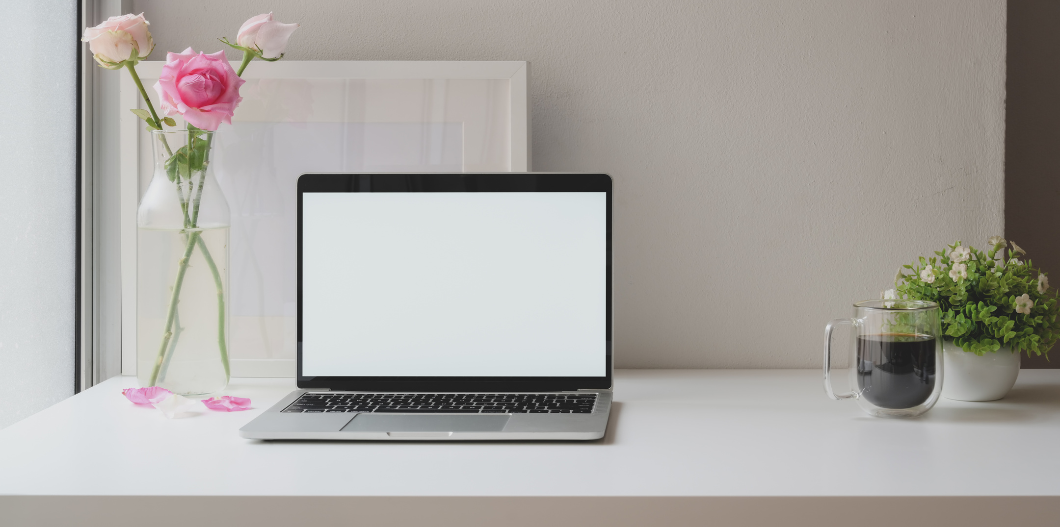 Macbook Pro on White Table